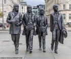 Статуя Битлз в Ливерпуле. Британская рок- и поп-группа, самая почитаемая и популярная в 1960-х годах и одна из самых влиятельных в истории музыки. Сформировано Джоном Ленноном, Полом Маккартни, Джорджем Харрисоном и Ринго Старром
